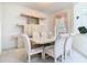 Bright dining room with neutral decor, stylish furniture, and plenty of space at 7323 Cypress Grove Rd # 87, Orlando, FL 32819