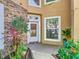 Inviting entryway with stone accents and lush landscaping at 7323 Cypress Grove Rd # 87, Orlando, FL 32819