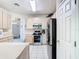 Spacious kitchen featuring stainless steel appliances and tile flooring at 7323 Cypress Grove Rd # 87, Orlando, FL 32819