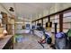Bright sunroom area, wood-look flooring, and plenty of natural light at 8248 Limetree Ct, Orlando, FL 32836