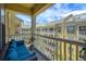 Comfortable balcony seating offers a tranquil view of the lush courtyard at 860 N Orange Ave # 448, Orlando, FL 32801