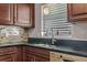 Stylish sink with stainless steel faucet and backsplash at 9447 Brackin St, Orlando, FL 32825