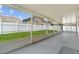 Enclosed back patio and backyard with privacy fence at 9447 Brackin St, Orlando, FL 32825