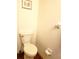 Standard white toilet with visible pipes and a simple, functional design at 983 Bucksaw Pl, Longwood, FL 32750
