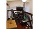 Cozy home office space featuring a wooden desk, ergonomic chair, and overhead lighting at 983 Bucksaw Pl, Longwood, FL 32750