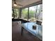 Covered porch features brick flooring and outdoor furniture that is great for entertaining at 983 Bucksaw Pl, Longwood, FL 32750