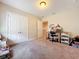 Spacious bedroom with ample closet space and a functional workspace for study or hobbies at 1551 Peterson Pl, Sanford, FL 32773