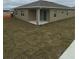 Back exterior view of home featuring a covered patio at 1575 Aspen Ave, Davenport, FL 33837