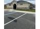 Exterior of community building with designated parking and accessible entrance at 1575 Aspen Ave, Davenport, FL 33837