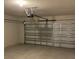 Spacious garage with an automatic door and ample room for parking at 1575 Aspen Ave, Davenport, FL 33837