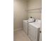 Functional laundry room equipped with a washer and dryer at 1575 Aspen Ave, Davenport, FL 33837