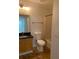 This bathroom offers a tub, toilet, and vanity with sink at 2007 Dixie Belle Dr # 2007 M, Orlando, FL 32812