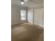 Bedroom featuring a ceiling fan and spacious closet for organized storage at 2007 Dixie Belle Dr # 2007 M, Orlando, FL 32812