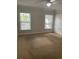Bedroom with a ceiling fan and large windows to maximize natural light at 2007 Dixie Belle Dr # 2007 M, Orlando, FL 32812