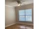 Bedroom featuring blinds on the window and a ceiling fan at 2007 Dixie Belle Dr # 2007 M, Orlando, FL 32812