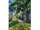 Picturesque pathway winding through well-maintained lawns and leading to residential buildings at 2007 Dixie Belle Dr # 2007 M, Orlando, FL 32812