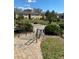 Brick walkway leads to meticulously kept green spaces and multi-Gathering homes with manicured grounds at 2007 Dixie Belle Dr # 2007 M, Orlando, FL 32812