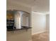 Kitchen with oak cabinets and black granite counter open to the living area at 2007 Dixie Belle Dr # 2007 M, Orlando, FL 32812