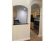 Kitchen with stainless steel appliances and wooden cabinets at 2007 Dixie Belle Dr # 2007 M, Orlando, FL 32812