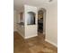 Open-concept living room, partial view of the kitchen at 2007 Dixie Belle Dr # 2007 M, Orlando, FL 32812