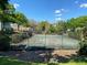 The tennis courts are surrounded by lush landscaping in this Gathering-friendly community at 2007 Dixie Belle Dr # 2007 M, Orlando, FL 32812