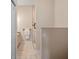 Bathroom featuring a tiled shower, modern fixtures, and a neutral color palette at 20199 Sweetwood Ln, Clermont, FL 34715