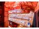Cigar humidor with a wide selection of cigars on wooden shelves and custom lighting at 20199 Sweetwood Ln, Clermont, FL 34715