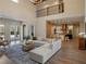 Open-concept living space with a view of the kitchen and a seamless flow at 20199 Sweetwood Ln, Clermont, FL 34715