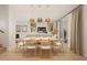 Dining area featuring pendant lighting, an open layout, and a view of the connected living room at 213 Breezeway Dr, Davenport, FL 33897