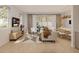Inviting living area with stylish furniture, sleek decor, and ample natural light at 213 Breezeway Dr, Davenport, FL 33897