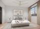 Comfortable bedroom featuring a queen bed, neutral tones, and lots of natural light at 213 Breezeway Dr, Davenport, FL 33897
