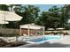 Outdoor swimming pool with surrounding patio, sun umbrellas, lounge chairs and pergola at 213 Breezeway Dr, Davenport, FL 33897