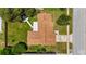 Overhead view of a single-story home boasting a spacious yard, mature trees, and a well-maintained roof at 226 Selkirk Way, Longwood, FL 32779
