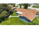 Aerial view of a charming single-story home with a well-maintained yard and outdoor gazebo at 226 Selkirk Way, Longwood, FL 32779