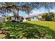 Spacious backyard featuring a gazebo with outdoor seating, perfect for relaxation and entertaining guests at 226 Selkirk Way, Longwood, FL 32779