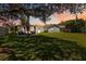 A spacious backyard features a cozy gazebo with seating, providing an inviting outdoor living space at 226 Selkirk Way, Longwood, FL 32779