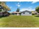 Spacious backyard with lush green grass and a relaxing gazebo at 226 Selkirk Way, Longwood, FL 32779