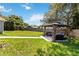 Expansive backyard with a gazebo and comfortable seating area, ideal for outdoor lounging and gatherings at 226 Selkirk Way, Longwood, FL 32779