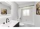 Bathroom featuring a dark vanity, a large mirror, and bathtub with shower at 226 Selkirk Way, Longwood, FL 32779