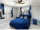 Bedroom features tile floors, bright light from the windows, and vibrant decor at 226 Selkirk Way, Longwood, FL 32779