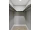 Empty closet featuring shelving, clean neutral walls, and tile flooring at 226 Selkirk Way, Longwood, FL 32779