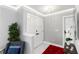 Bright foyer featuring double doors, a chair and marble floors at 226 Selkirk Way, Longwood, FL 32779