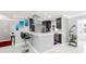 Kitchen features white marble bar, navy blue cabinets, and stainless appliances at 226 Selkirk Way, Longwood, FL 32779