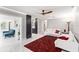 Bright living room with marble floors flowing into kitchen and sunroom at 226 Selkirk Way, Longwood, FL 32779
