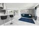 Bright living room with marble floors, and a view of the modern kitchen at 226 Selkirk Way, Longwood, FL 32779