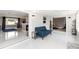 Open-concept living room with marble floors, recessed lighting, and seamlessly connected spaces for entertaining and relaxation at 226 Selkirk Way, Longwood, FL 32779