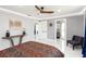 Bright bedroom featuring marble floors, ensuite, and a modern ceiling fan at 226 Selkirk Way, Longwood, FL 32779