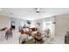 Bright living room featuring stylish furniture, ample natural light, and an open floor plan at 245 Streamliner Way, Groveland, FL 34736