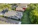 Aerial shot of property showing backyard, lush landscaping, and roof of home at 2520 Oakington St, Winter Garden, FL 34787