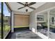 Screened-in patio with an outdoor ceiling fan and backyard views at 2520 Oakington St, Winter Garden, FL 34787